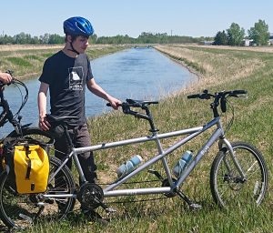 Connor holding tandem bike