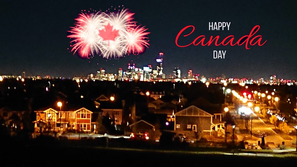 Downtown Edmonton at night with modified Happy Canada Day and fireworks image from Freepic